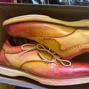 Vibrant Yellow and Red Wingtip Shoes